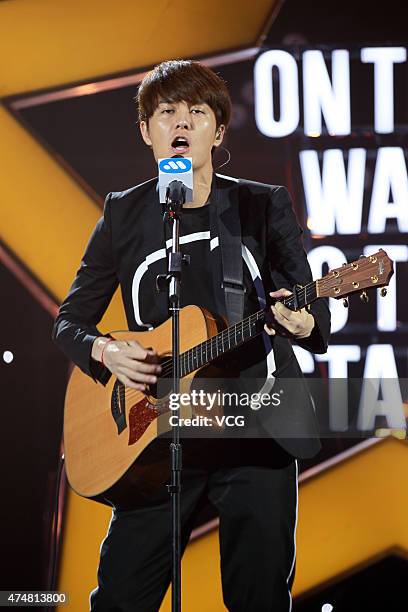Singer Kenji Wu attends victory meeting for his new album "On The Way To The Star" and actress Zhang Jingchu attends as a guest on May 26, 2015 in...