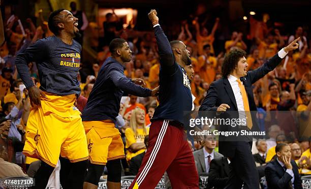 The Cleveland Cavaliers bench reacts in the fourth quarter against the Atlanta Hawks during Game Four of the Eastern Conference Finals of the 2015...