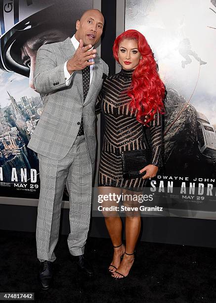 Actor Dwayne "The Rock" Johnson and Eva Marie attend the "San Andreas" Los Angeles Premiere at TCL Chinese Theatre IMAX on May 26, 2015 in Hollywood,...