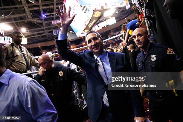 Head coach David Blatt of the Cleveland Cavaliers celebrates after defeating the Atlanta Hawks during Game Four of the Eastern Conference Finals of...