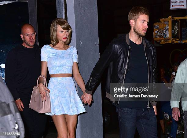 Taylor Swift and Calvin Harris leave L'asso restaurant on May 26, 2015 in New York City.