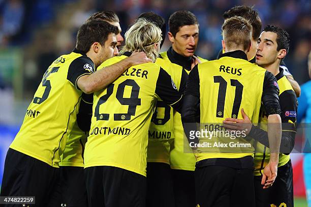 Henrikh Mkhitaryan of Dortmund celebrates his team's first goal with team mates during the UEFA Champions League Round of 16 match between FC Zenit...