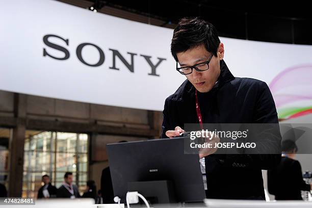 Visitor takes a photo of a Xperia tablet Z2 by "Sony" in Barcelona on February 25 on the second day of the 2013 Mobile World Congress. The 2014...