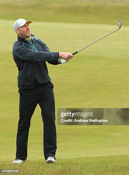Rugby Player Stephen Ferris hits a shot during the Pro-Am round prior to the Irish Open at Royal County Down Golf Club on May 27, 2015 in Newcastle,...