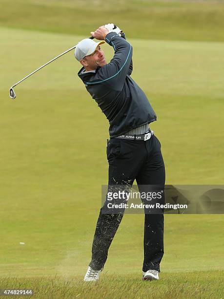Rugby Player Stephen Ferris hits a shot during the Pro-Am round prior to the Irish Open at Royal County Down Golf Club on May 27, 2015 in Newcastle,...