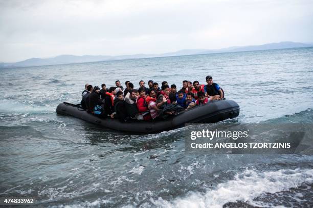 Dinghy overcrowded with Afghan immigrants arrived on a beach on the Greek island of Kos, after crossing a part of the Aegean Sea between Turkey and...