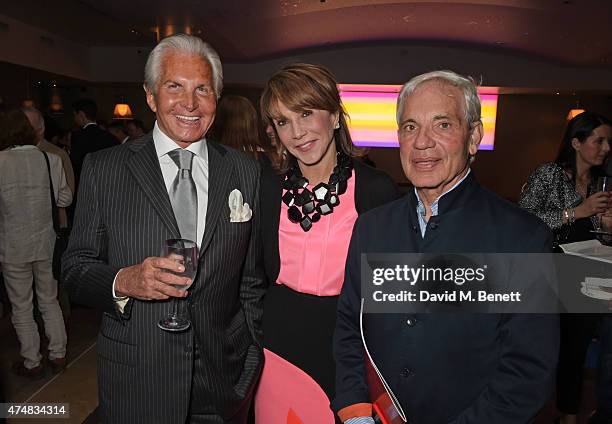 George Hamilton, Mila Mulroney and Simon Reuben attend an after party celebrating the VIP Gala Preview of "The Elephant Man" at The Haymarket Hotel...