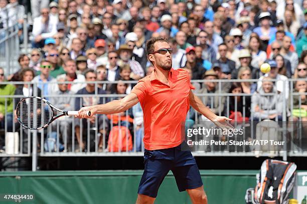 Jerzy Janowicz of Poland in action in his win against Maxime Hamou of France at the French Open, Roland Garros Stadium on May 26, 2015 in Paris,...