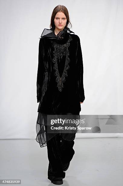 Model walks the runway during the Moon Young Hee show as part of Paris Fashion Week Womenswear Fall/Winter 2014-2015 on February 25, 2014 in Paris,...