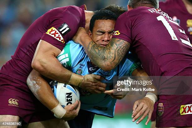 Will Hopoate of the Blues is tackled during game one of the State of Origin series between the New South Wales Blues and the Queensland Maroons at...