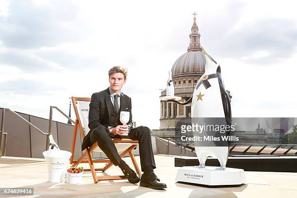 Oliver Cheshire poses at the launch of Moet Ice Imperial Summer Terrace Pop Up at Madison Rooftop Bar on May 26, 2015 in London, England.