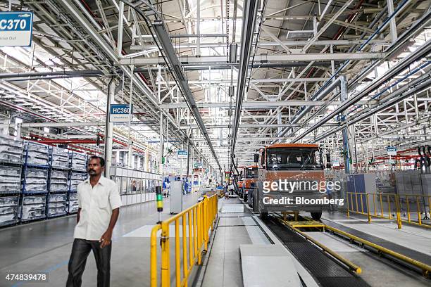 BharatBenz trucks sit on the production line of the Daimler India Commercial Vehicles Pvt. Manufacturing plant in Chennai, India, on Tuesday, May 19,...