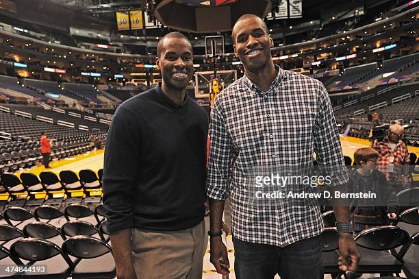 Jarron Collins poses for a picture with twin brother Jason Collins of the Brooklyn Nets after the game against the Los Angeles Lakers at STAPLES...