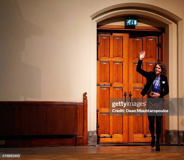Ireen Wust arrives in the main hall for the Dutch Winter Olympic Medal winners ceremony held at the Ridderzaal on February 25, 2014 in The Hague,...
