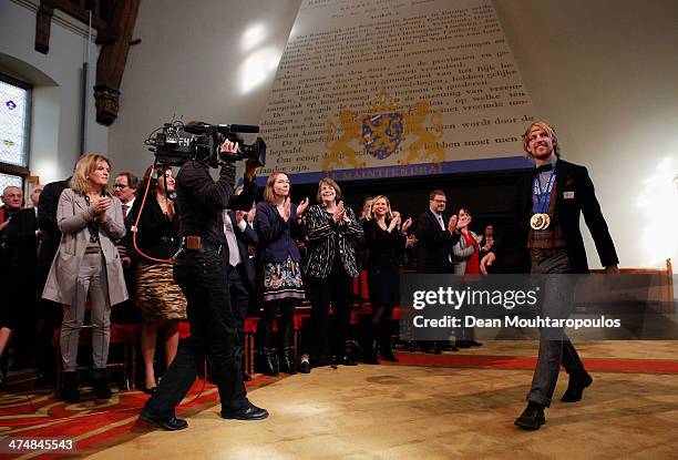 Michel Mulder arrives in the main hall for the Dutch Winter Olympic Medal winners ceremony held at the Ridderzaal on February 25, 2014 in The Hague,...