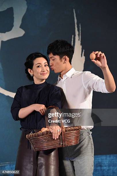 Actress Qin Hailu and actor Jing Boran attend "Tale of Three Cities" press conference on May 27, 2015 in Beijing, China.