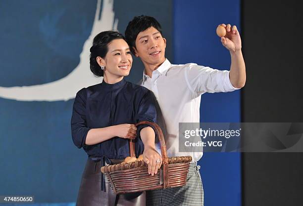 Actress Qin Hailu and actor Jing Boran attend "Tale of Three Cities" press conference on May 27, 2015 in Beijing, China.