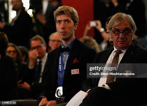 Jorrit Bergsma and President / Chairman of NOC*NSF, Andre Bolhuis watch the big screen during the Dutch Winter Olympic Medal winners ceremony held at...