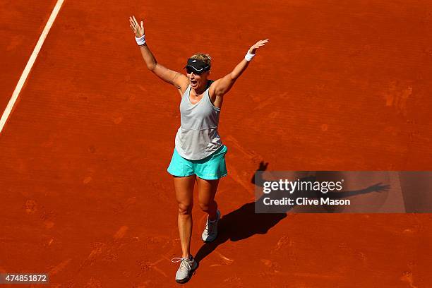 Mirjana Lucic-Baroni of Croatia celebrates match point in her Women's Singles match against Simona Halep of Romania during day four of the 2015...