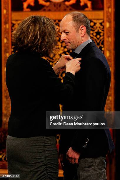 Netherlands Sport Minister, Edith Schippers pins Gerard Kemkers with his Ridder in de Orde van Oranje-Nassau or Knight in the Order of Orange-Nassau...