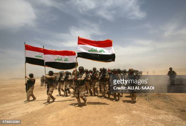 Thousands of Iraqi soldiers take part in a training exercise led by the Spanish Army and under the guidance of the US military in the Basmaya camp in...