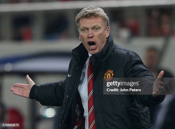 Manager David Moyes of Manchester United watches from the touchline during the UEFA Champions League Round of 16 match between Olympiacos FC and...