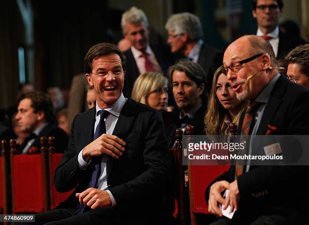 Netherlands Prime Minister, Mark Rutte speaks to Chef de Mission, Maurits Hendriks prior to the Dutch Winter Olympic Medal winners ceremony held at...