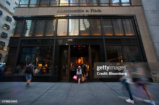 Shoppers enter the Abercrombie & Fitch Co. Store on 5th Avenue in New York, U.S., on Tuesday, May 26, 2015. Abercrombie & Fitch Co. Is scheduled to...