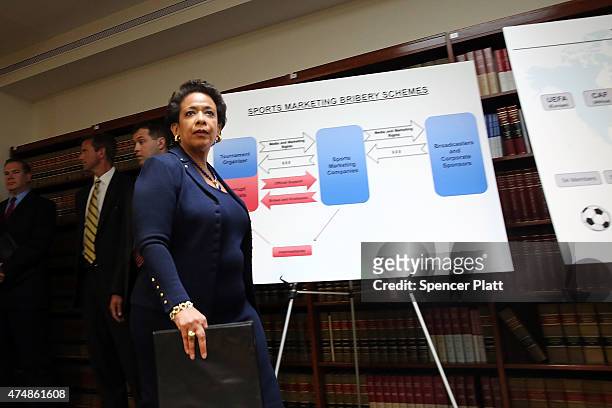 Attorney General Loretta Lynch enters a packed news conference at the U.S. Attorneys Office of the Eastern District of New York following the early...