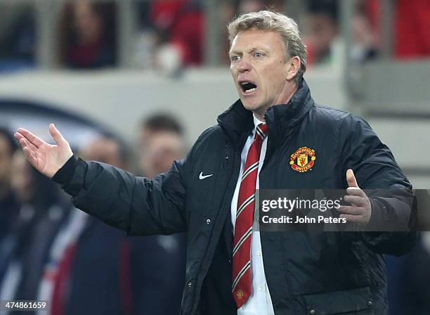 Manager David Moyes of Manchester United watches from the touchline during the UEFA Champions League Round of 16 match between Olympiacos FC and...