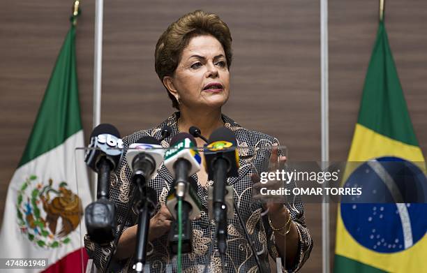 Brazilian President Dilma Rousseff speaks during a press conference prior to her visit to the Mexican Senate in Mexico City on May 27 in the second...