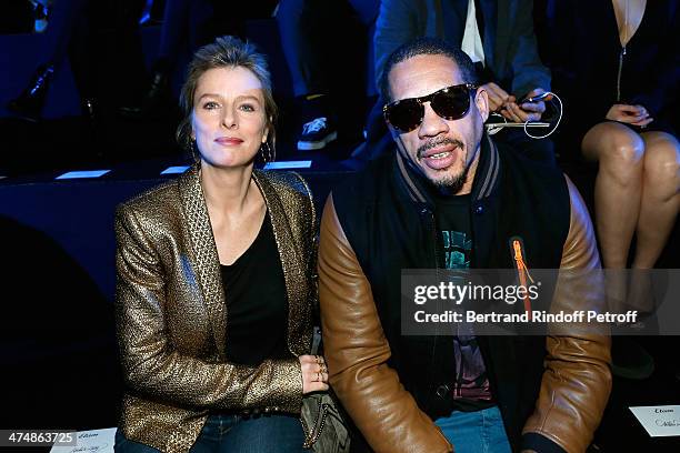 Karine Viard and JoeyStarr attend ETAM show as part of the Paris Fashion Week Womenswear Fall/Winter 2014-2015 on February 25, 2014 in Paris, France.