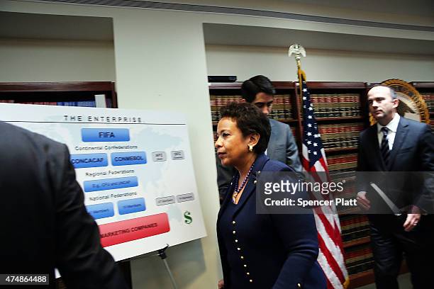 Attorney General Loretta Lynch exits a packed news conference at the U.S. Attorneys Office of the Eastern District of New York following the early...