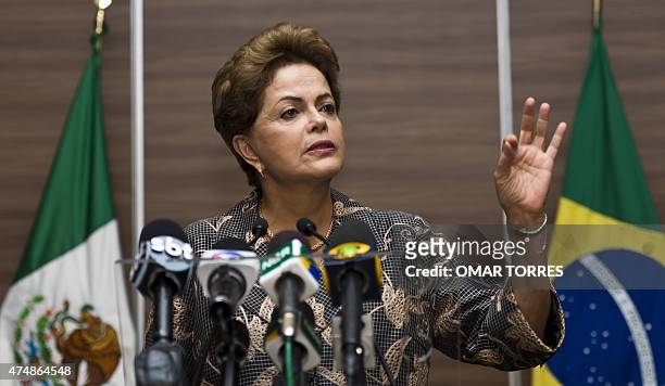 Brazilian President Dilma Rousseff speaks during a press conference prior to her visit to the Mexican Senate in Mexico City on May 27 during the...