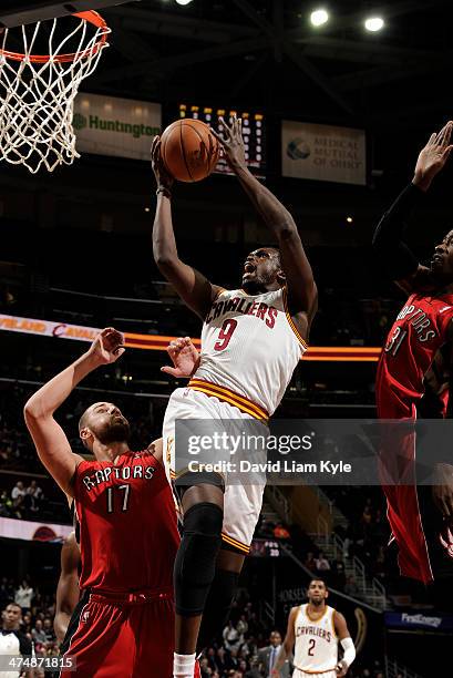 Luol Deng of the Cleveland Cavaliers goes up for the shot against Jonas Valanciunas of the Toronto Raptors at The Quicken Loans Arena on February 25,...