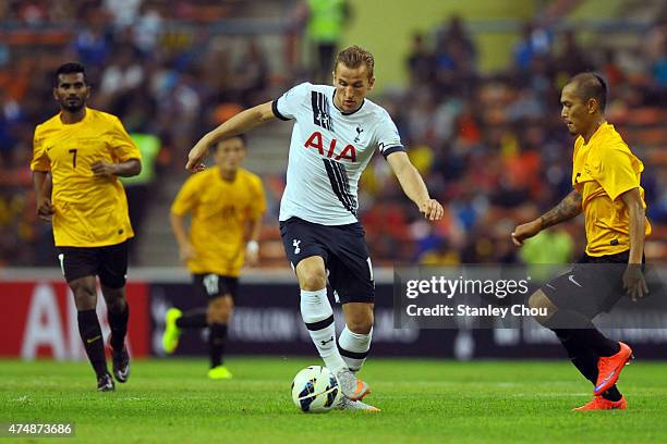 Harry Kane of Tottenham Hotspur controls the ball during the pre-season friendly match between Malaysia XI and Tottenham Hotspur at Shah Alam Stadium...