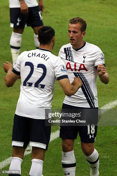 Harry Kane of Tottenham Hotspur is substituted by Nacer Chadli during the pre-season friendly match between Malaysia XI and Tottenham Hotspur at Shah...