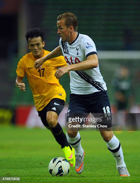 Harry Kane of Tottenham Hotspur runs with the ball during the pre-season friendly match between Malaysia XI and Tottenham Hotspur at Shah Alam...