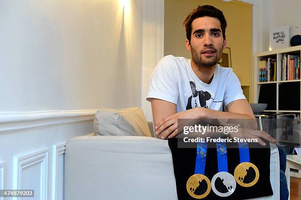 Portrait of French biathlete Martin Fourcade and his three Olympic Medals, two gold and a silver from the XXII Winter Olympic Games Sotchi 2014 at on...