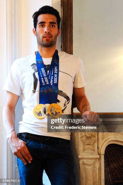 Portrait of French biathlete Martin Fourcade and his three Olympic Medals, two gold and a silver from the XXII Winter Olympic Games Sotchi 2014 at on...