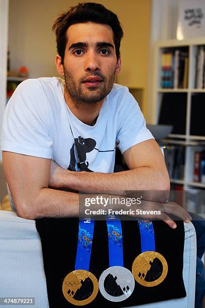 Portrait of French biathlete Martin Fourcade and his three Olympic Medals, two gold and a silver from the XXII Winter Olympic Games Sotchi 2014 at on...