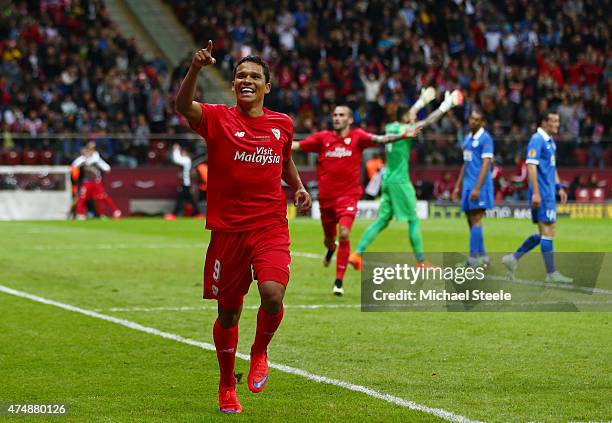 Carlos Bacca of Sevilla celebrates scoring his team's third goal during the UEFA Europa League Final match between FC Dnipro Dnipropetrovsk and FC...