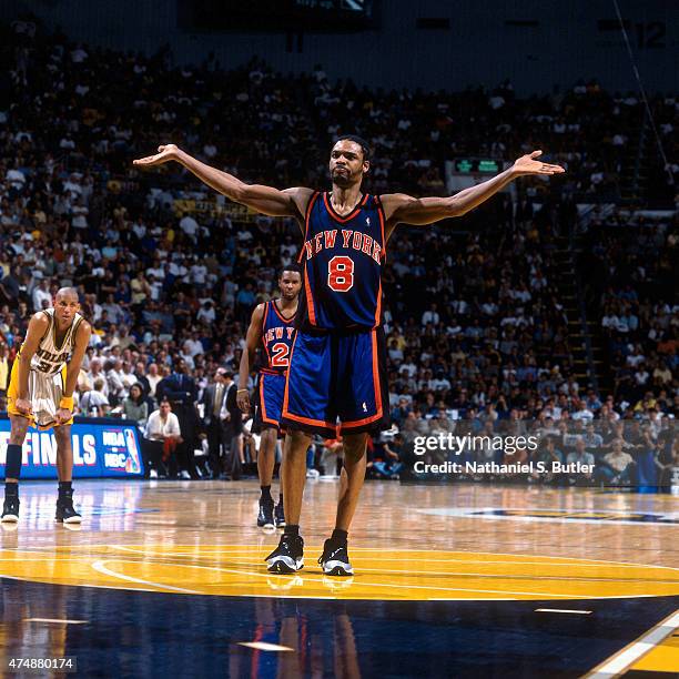 Latrell Sprewell of the New York Knicks reacts to a play against the Indiana Pacers during a game in 1999 at Market Square Arena in Indianapolis,...