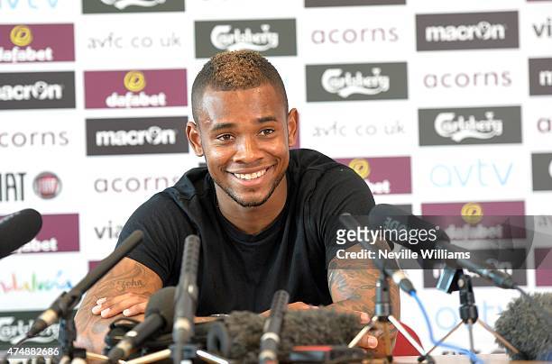 Leandro Bacuna of Aston Villa speaks to the media during the Aston Villa FA Cup Final media day at Bodymoor Heath training ground on May 26, 2015 in...
