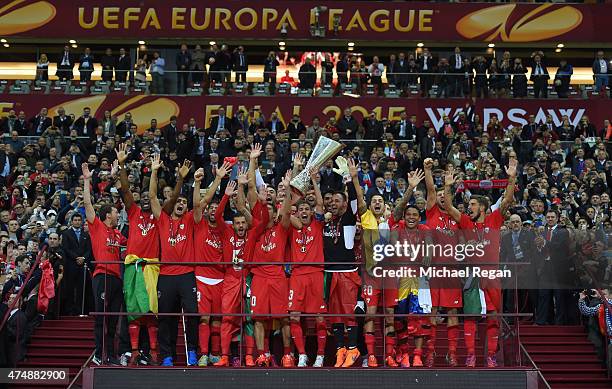 Fernando Navarro of Sevilla lifts the trophy after his team's victory during the UEFA Europa League Final match between FC Dnipro Dnipropetrovsk and...