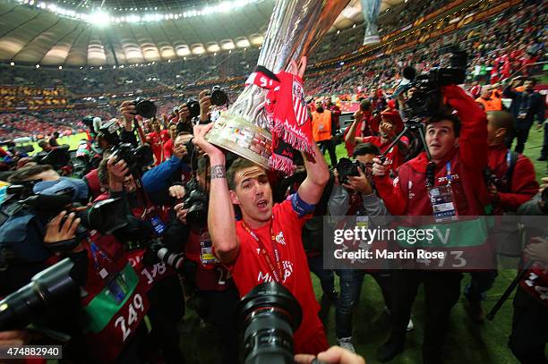 Fernando Navarro of Sevilla lifts the trophy after his team's victory during the UEFA Europa League Final match between FC Dnipro Dnipropetrovsk and...