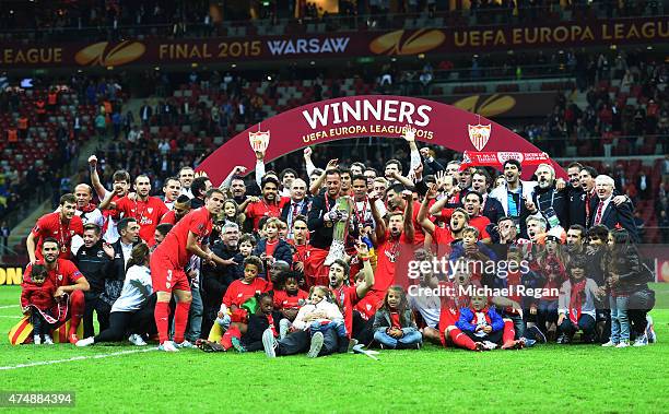 Sevilla players celebrate victory with the trophy after the UEFA Europa League Final match between FC Dnipro Dnipropetrovsk and FC Sevilla on May 27,...