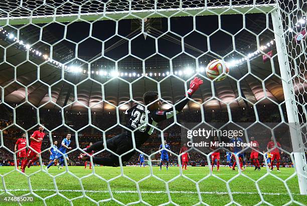 Ruslan Rotan of Dnipro scores his team's second goal with a free kick past Sergio Rico of Sevilla during the UEFA Europa League Final match between...