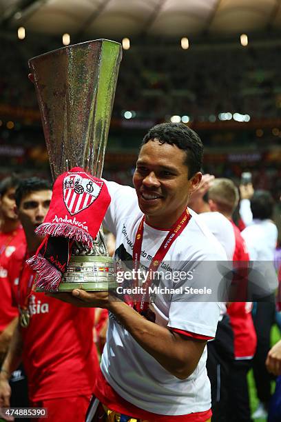 Carlos Bacca of Sevilla celebrates victory with the trophy after the UEFA Europa League Final match between FC Dnipro Dnipropetrovsk and FC Sevilla...
