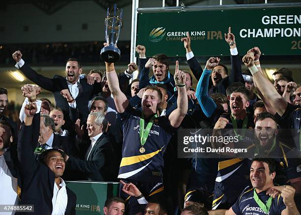 Van Velze, the Worcester captain, lifts the trophy after their victory during the Greene King IPA Championship Final 2nd leg match between Worcester...